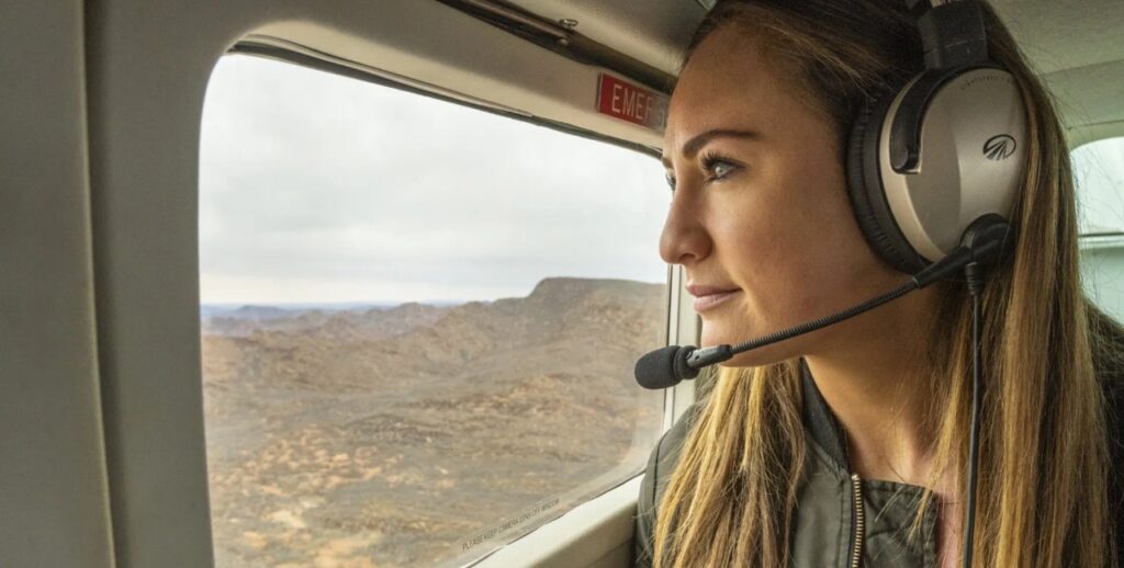 Passenger flying over Arkaroola Sanctuary wearing a Lightspeed Aviation Zulu 3 ANR headset